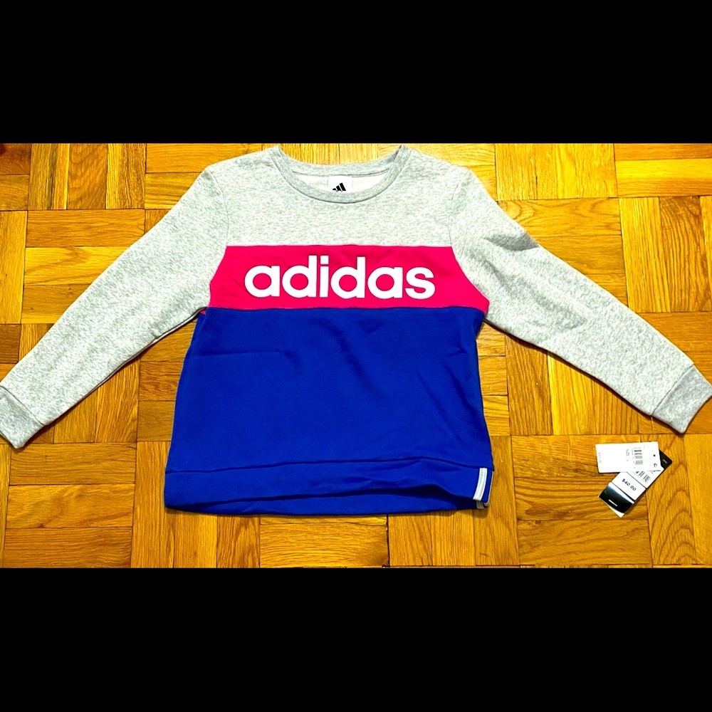 Adidas sweatshirt. 60% cotton 40% polyester.